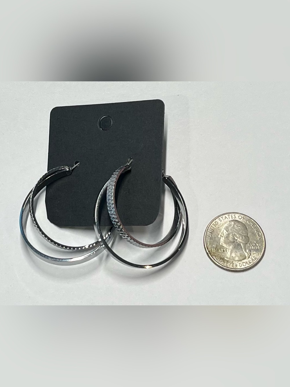 Large Hoop Style Silver Colored Earrings